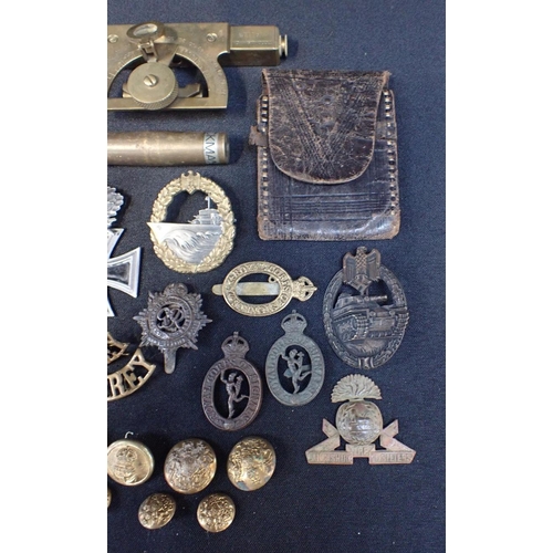 383 - A COLLECTION OF MILITARY BADGES

cap badges, some German (some a/f), and a T. Cook and Simmon sight