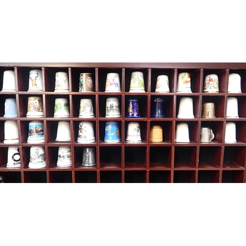 49 - COLLECTION OF THIMBLES

mostly ceramic, in display case