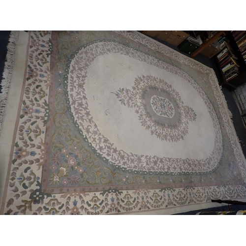 529 - A LARGE CREAM GROUND CHINESE RUG

273 x 370cm