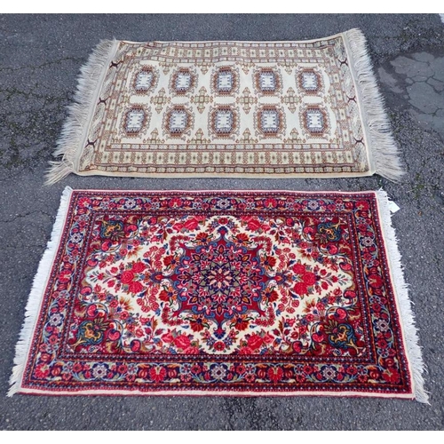 534 - A SMALL HAND KNOTTED PERSIAN RUG

in bright colours 72 x 105cm plus fringes, and another 84 x 107cm ... 