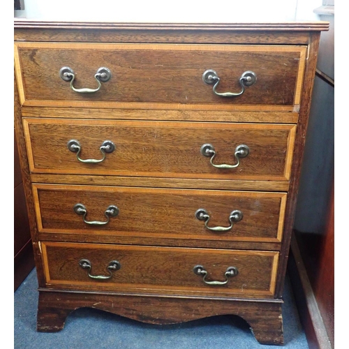 544 - A SMALL REPRODUCTION MAHOGANY CHEST OF DRAWERS

with satinwood banding, on splayed bracket feet 61cm... 