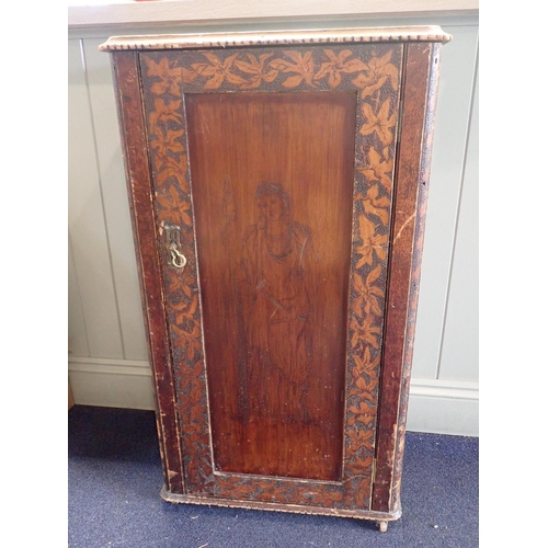 545 - A VICTORIAN STAINED PINE MUSIC CABINET

with pokerwork  decoration to the door and chip carved top 5... 