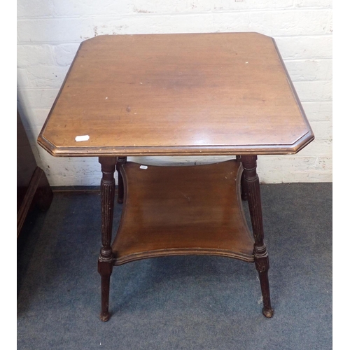 546 - AN EDWARDIAN OCCASIONAL TABLE

the top with canted corners, and angled reeded legs 53cm square