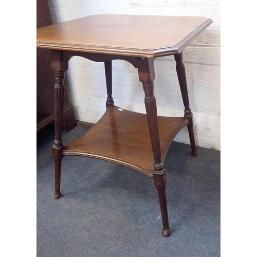 546 - AN EDWARDIAN OCCASIONAL TABLE

the top with canted corners, and angled reeded legs 53cm square