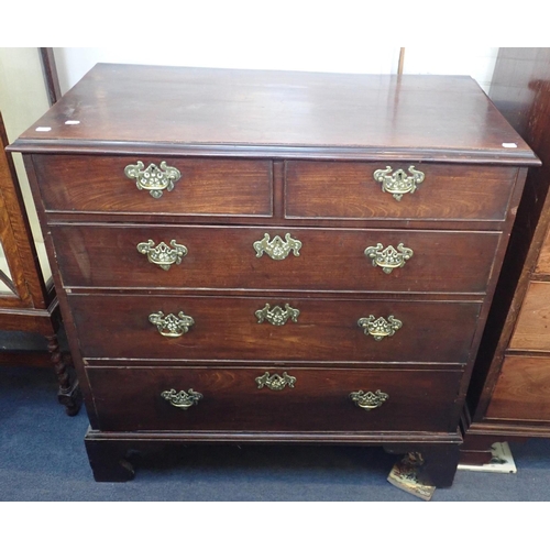 549 - A GEORGE III MAHOGANY CHEST OF DRAWERS

three long and two short, the brass handles with pierced bac... 