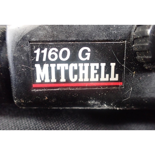 55 - A MITCHELL SPINNING REEL

and a quantity of other fishing related items