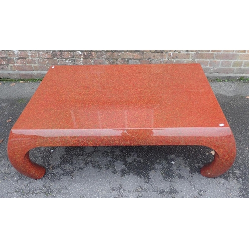 561 - A CHINESE STYLE RED LACQUER LOW TABLE

90 x 130cm (max, at leg) (some cracks)