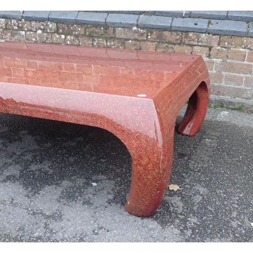 561 - A CHINESE STYLE RED LACQUER LOW TABLE

90 x 130cm (max, at leg) (some cracks)