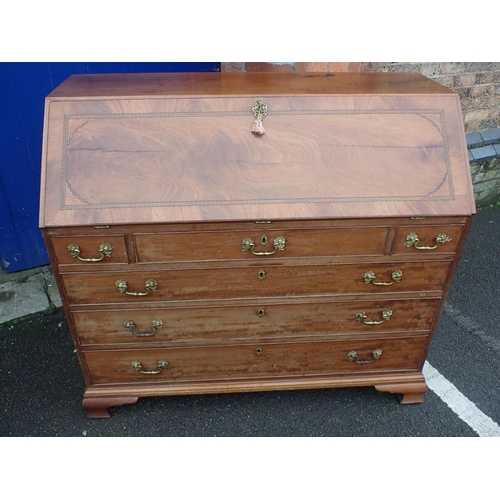 573 - A GEORGE III MAHOGANY BUREAU WITH HOLLY VENEERED AND PENWORK DECORATED ARCADE

to the interior, with... 