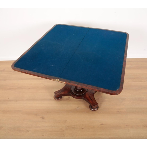 578 - A WILLIAM IV ROSEWOOD CARD TABLE

the hinged top opening to a blue baize lined interior, a moulded a... 