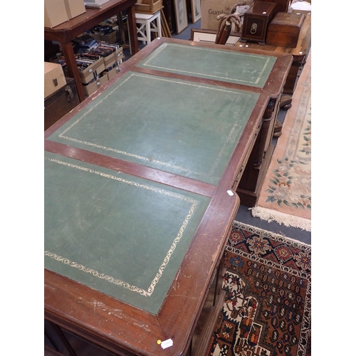 579 - A GEORGE III STYLE MAHOGANY PARTNERS DESK

(reproduction) with arrangement of drawers and cupboards,... 