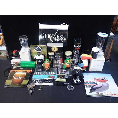 71 - A COLLECTION OF GUINNESS THEMED MERCHANDISE AND SOUVENIRS

including commemoratives, domestic and fu... 