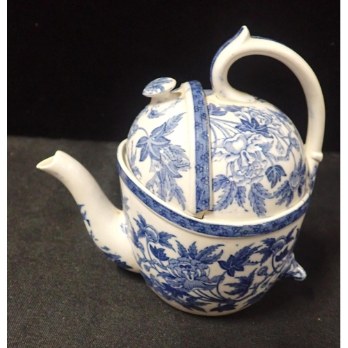 77 - A WEDGWOOD 'S.Y.P.' BLUE AND WHITE POTTERY TEAPOT

peony pattern, designed by Douglas Baillie, 17cm ... 