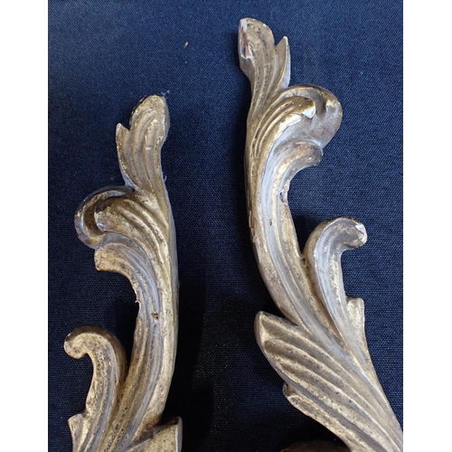 88 - THREE GILTWOOD FOLIATE ROCOCO SCROLLS

39cm long