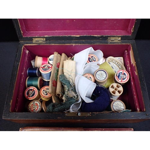 91 - A 19th CENTURY WALNUT WORKBOX

with parquetry top 'WORKBOX', and some contents, including a leather ... 