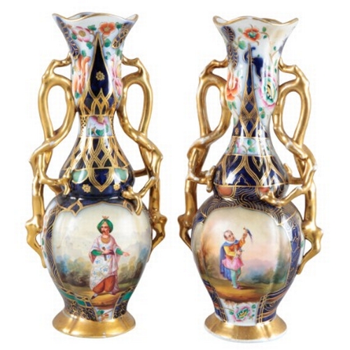 1 - TWO PAIRS OF CONTINENTAL PORCELAIN VASES

19th century, both pairs marked 'L. F.' to the base, with ... 