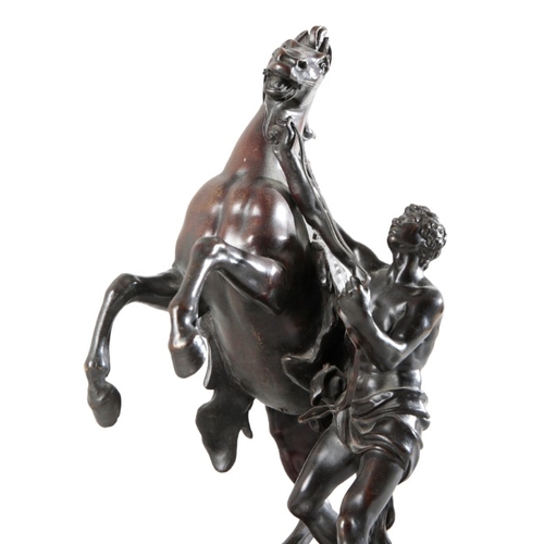 151 - AFTER GUILLAUME I COUSTOU (1677-1746) A pair of bronze marly horses

on naturalistic plinth bases, 4... 