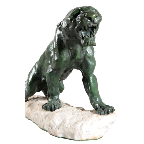 156 - EUGENE CARTIER (1861-1943) A patinated bronze figure of a Jaguar

signed 'Cartier' to the base, figu... 