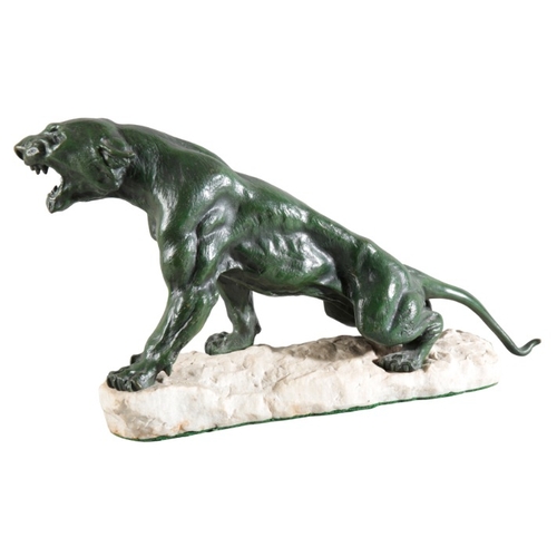 156 - EUGENE CARTIER (1861-1943) A patinated bronze figure of a Jaguar

signed 'Cartier' to the base, figu... 