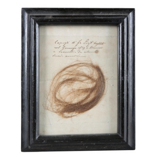 178 - A LOCK OF HAIR ASCRIBED TO FRANZ LISZT (1811-1886)

dated 1839, with a monogrammed leather cigar cas... 