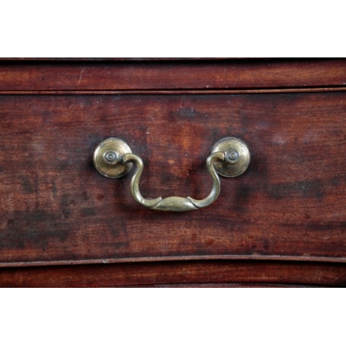 212 - A GEORGE III MAHOGANY SERPENTINE CHEST OF DRAWERS

with four graduated drawers on shaped bracket fee... 