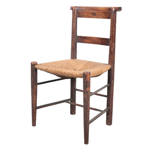 230 - A SET OF SEVEN BEECH SIDE CHAIRS

19th century, with square back splats over rush seats, on turned l... 