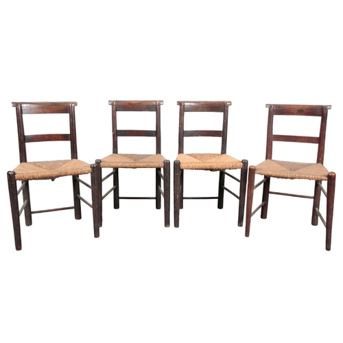 232 - A SET OF TEN BEECH SIDE CHAIRS

19th century, with square back splats over rush seats, on turned leg... 