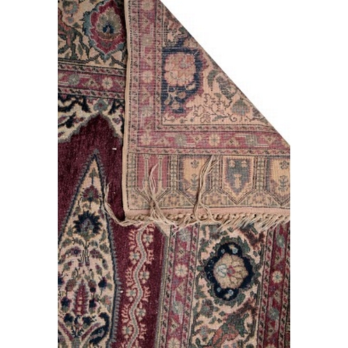 236 - AN ANTIQUE TURKISH SILK 'MOSQUE' PRAYER RUG

woven in colours with nine arches for multiple worshipp... 