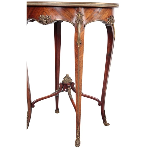 241 - A LOUIS XV STYLE KINGWOOD, MARQUETRY AND GILT METAL MOUNTED OCCASIONAL TABLE

the oval top inlaid wi... 