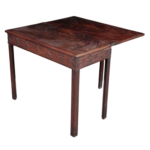 248 - A GEORGE III MAHOGANY TEA TABLE

the hinged lid over a relief carved frieze, on block legs, 73cm hig... 