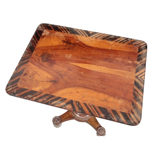 258 - A WILLIAM IV ROSEWOOD OCCASIONAL TABLE IN THE MANNER OF GILLOWS

the rectangular top with exotic woo... 