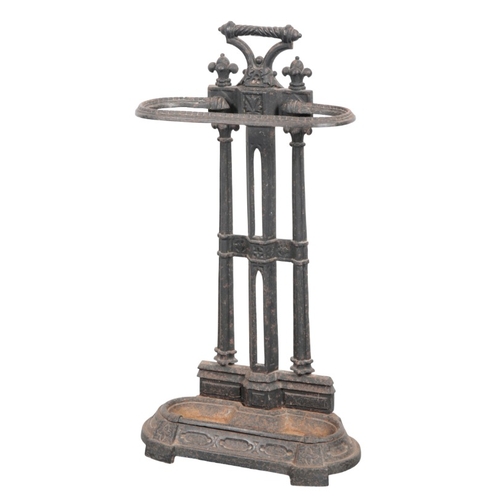 270 - A VICTORIAN CAST IRON STICK STAND

a date mark to the reverse, with drop in drip tray, 75cm high x 4... 