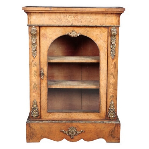 271 - A VICTORIAN WALNUT AND MARQUETRY PIER CABINET

the single glazed cupboard door opening to a shelved ... 