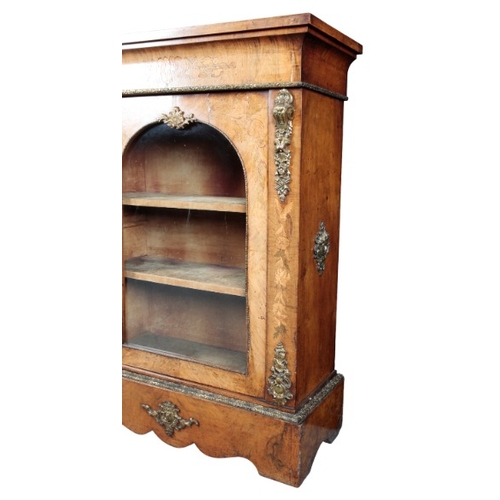 271 - A VICTORIAN WALNUT AND MARQUETRY PIER CABINET

the single glazed cupboard door opening to a shelved ... 