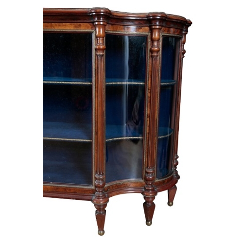 272 - A VICTORIAN WALNUT AND GILT METAL MOUNTED CREDENZA

with a glazed cupboard door opening to a shelved... 