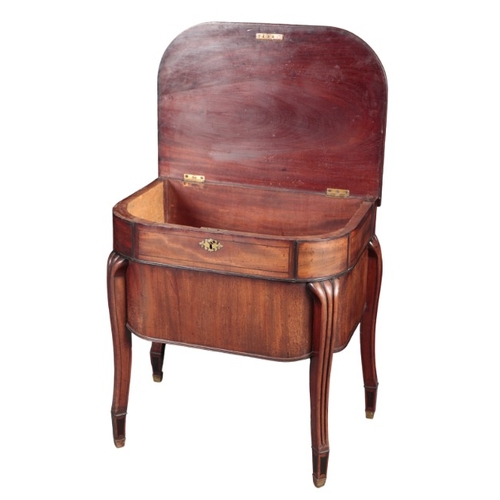 276 - A REGENCY MAHOGANY CELLARETTE

the hinged lid opening to a fitted interior, on moulded legs terminat... 