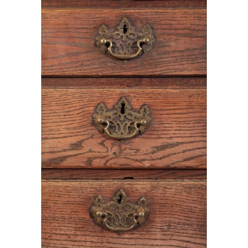 280 - A GEORGE II OAK CHEST ON STAND

mid 18th century, the upper section with a dentil moulded cornice ov... 