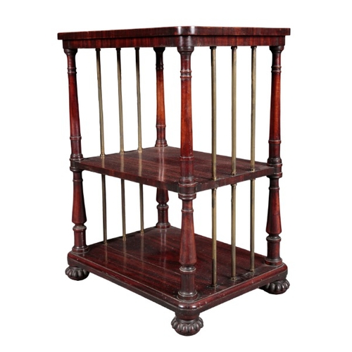 294 - A GEORGE IV ROSEWOOD WHATNOT IN THE MANNER OF GILLOWS

the three tiers on baluster turned corner sup... 