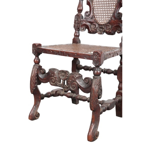 299 - A PAIR OF CHARLES II WALNUT AND CANED HIGH BACK CHAIRS

each with twin crown finials, carved through... 