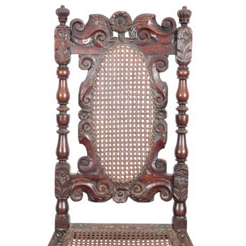 299 - A PAIR OF CHARLES II WALNUT AND CANED HIGH BACK CHAIRS

each with twin crown finials, carved through... 