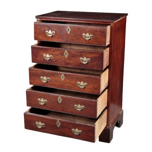 308 - A GEORGE III MAHOGANY CHEST OF DRAWERS

the five graduated drawers becoming shallower towards the ba... 