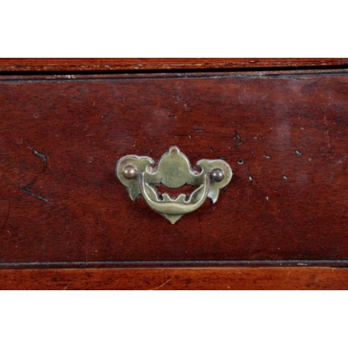 308 - A GEORGE III MAHOGANY CHEST OF DRAWERS

the five graduated drawers becoming shallower towards the ba... 