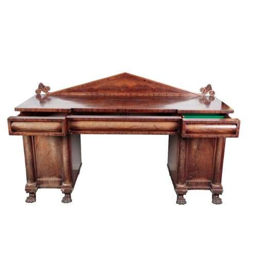 310 - A REGENCY MAHOGANY PEDESTAL SIDEBOARD

the top with a raised gallery over three frieze drawers, each... 