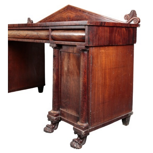 310 - A REGENCY MAHOGANY PEDESTAL SIDEBOARD

the top with a raised gallery over three frieze drawers, each... 