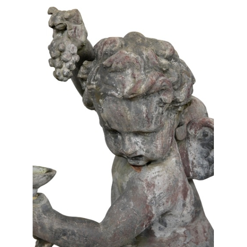 327 - A PAIR OF LEAD 'BACCHANALIAN' CHERUBS

19th century, both figured holding grapes and drinking vessel... 