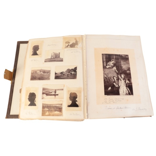 395 - DORSET INTEREST: A VICTORIAN BROWN LEATHER PHOTOGRAPH ALBUM RELATING TO MELBURY, C.1868

containing ... 