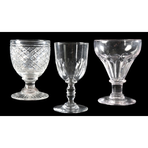 53 - A SET OF FOUR ENGLISH GLASS RUMMERS

19th century, with wide faceted bowls on knopped stems, 15cm hi... 