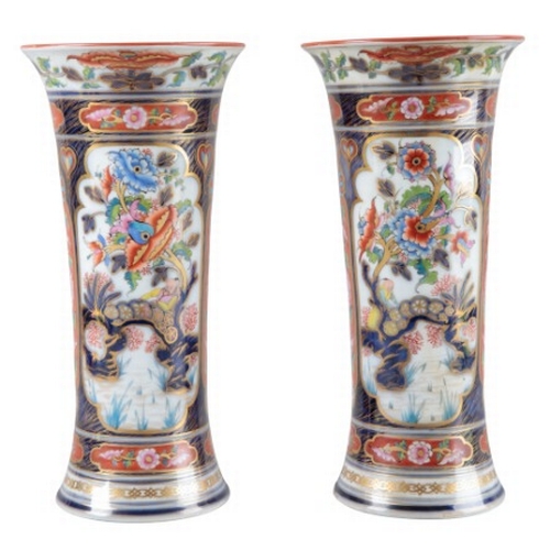 7 - A PAIR OF CONTINENTAL PORCELAIN SLEEVE VASES

19th century, decorated in the Chinoiserie taste with ... 