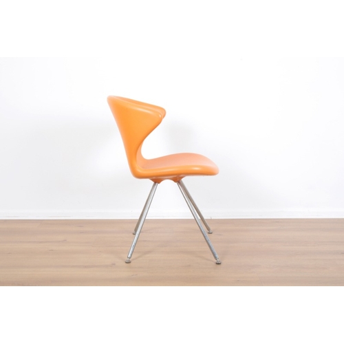 11 - A TONON 'CONCEPT' DINING CHAIR, DESIGNED BY MARTIN BALLENDAT

Italian, in orange with brushed chrome... 