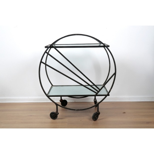 187 - AN ART DECO STYLE DRINKS CART

mid-century modern, the black metal circular outline with sunray deta... 